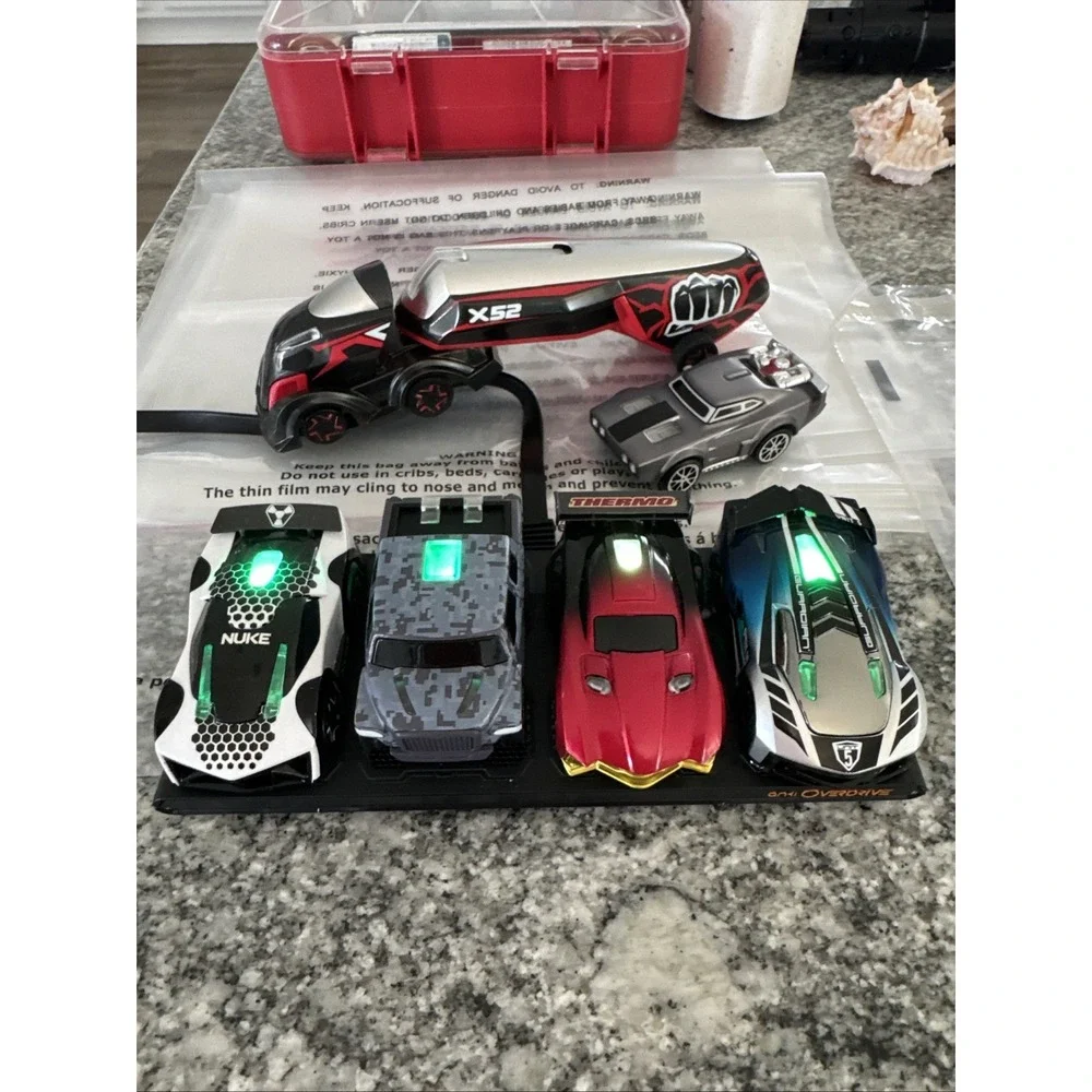 6 Anki Drive Cars & Semi w/ Charging Pods #019
